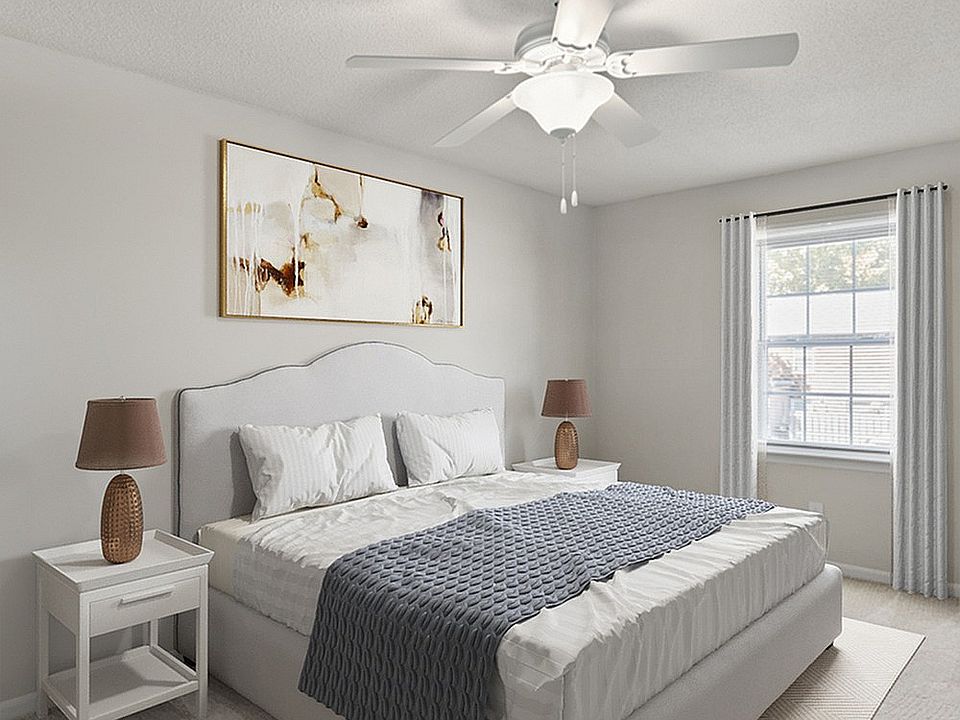 Experience relaxation in this elegantly designed bedroom, complete with modern amenities.