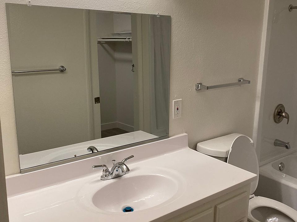 Bathroom with new show, sink and toilet and extra storage