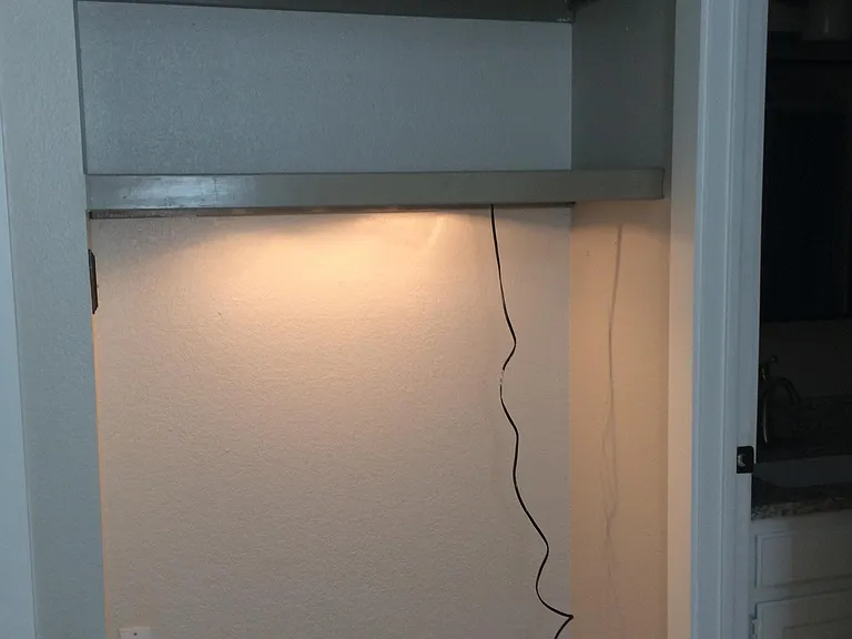 #2 Bedroom with built in study nook. Shelves and light provide great area for a desk.
