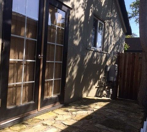 French Doors to Carmel stone side patio