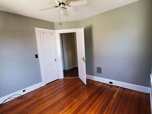 Bedroom #1 with closet and ceiling fan (main level).