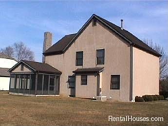 The screened porch off the fam