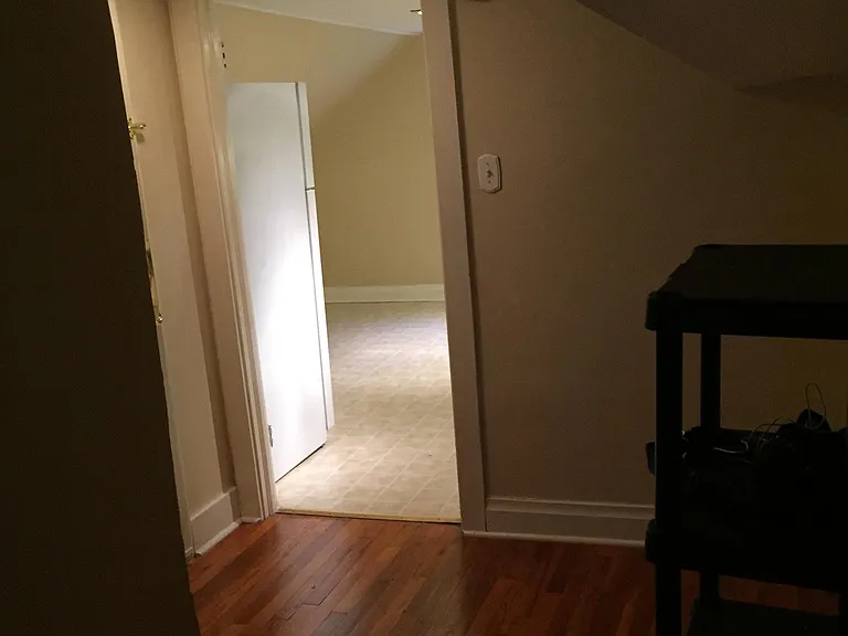 Entry foyer Apt C doorway to kitchen