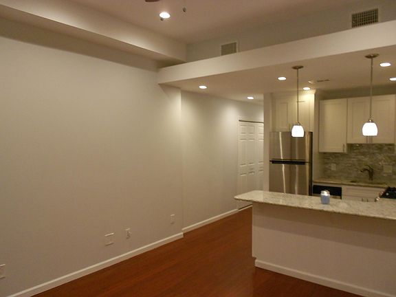 cherry floors with tall ceilings 