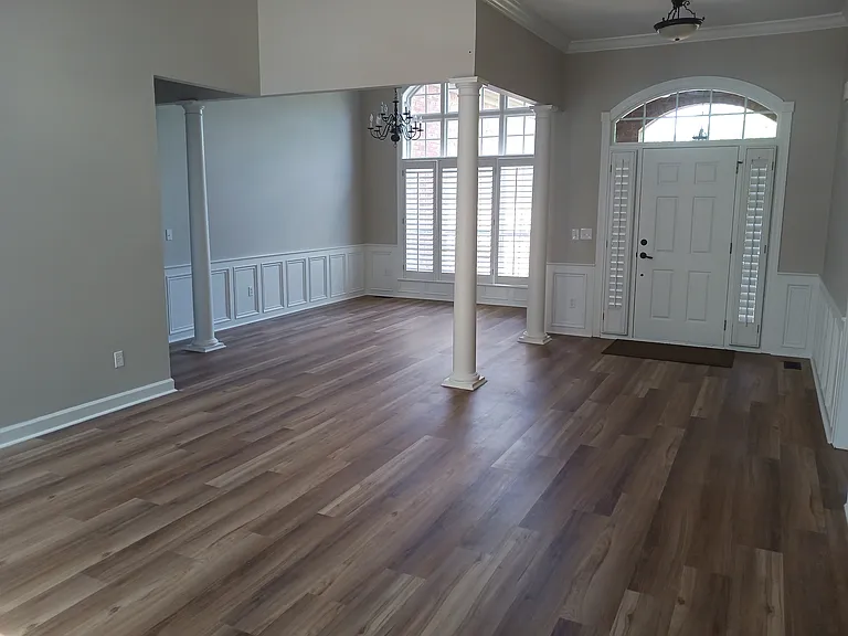 Formal dining area with wainscoting