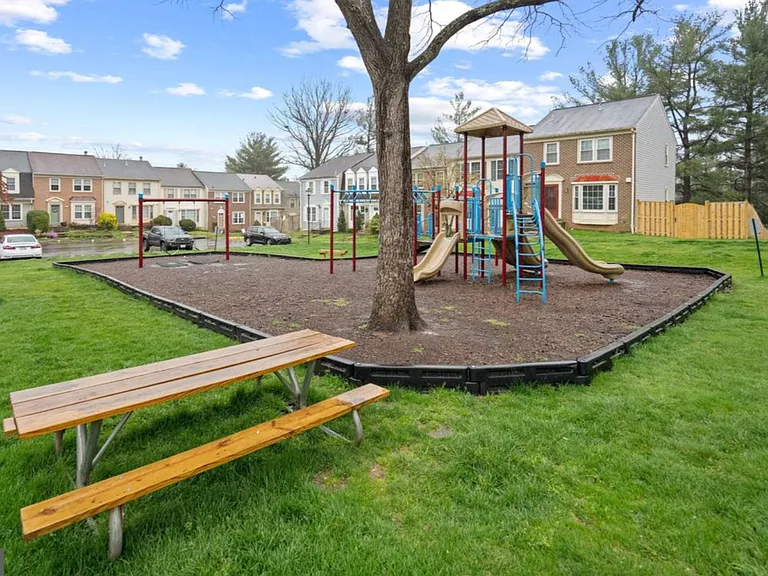 Playground is across the street in the neighborhood