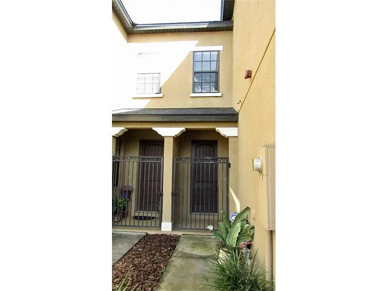 Entrance to Unit with a gate that can be kept secured. - 2332 Aloha Bay Ct