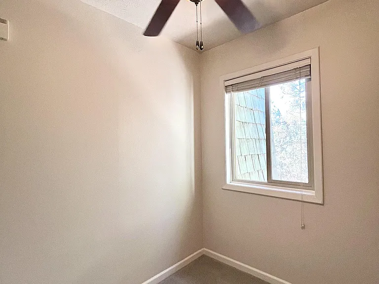 Top of stairs landing (could act as an office)