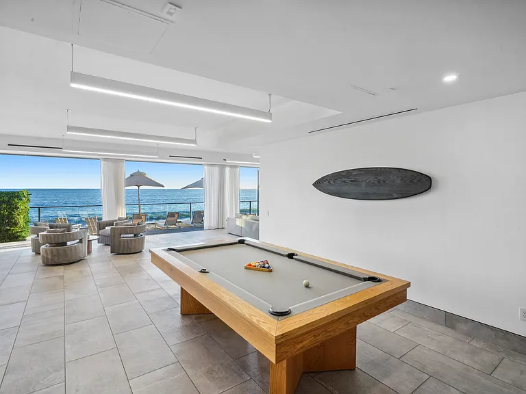 Unwind with a game of pool, where every shot comes with an ocean view.