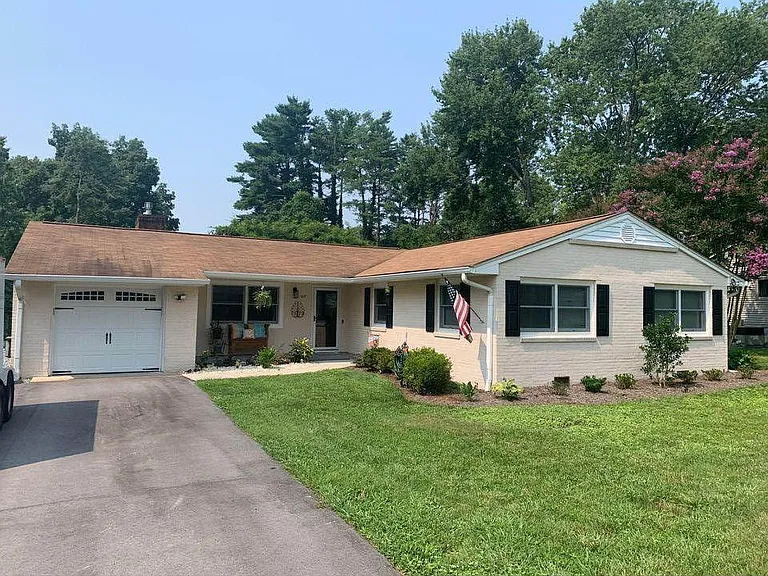Front yard and oversized driveway