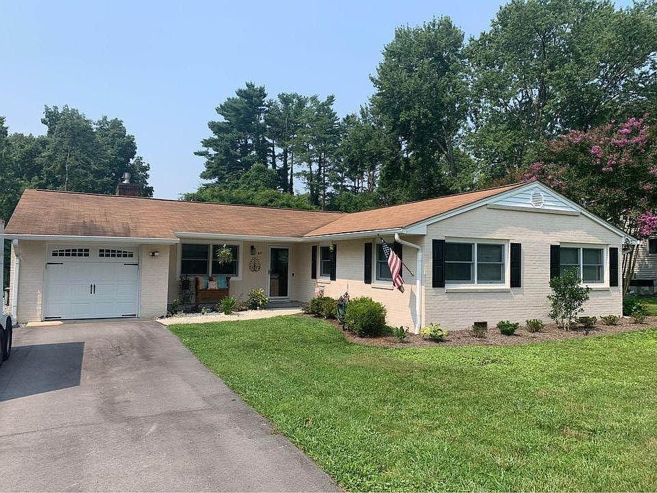 Front yard and oversized driveway