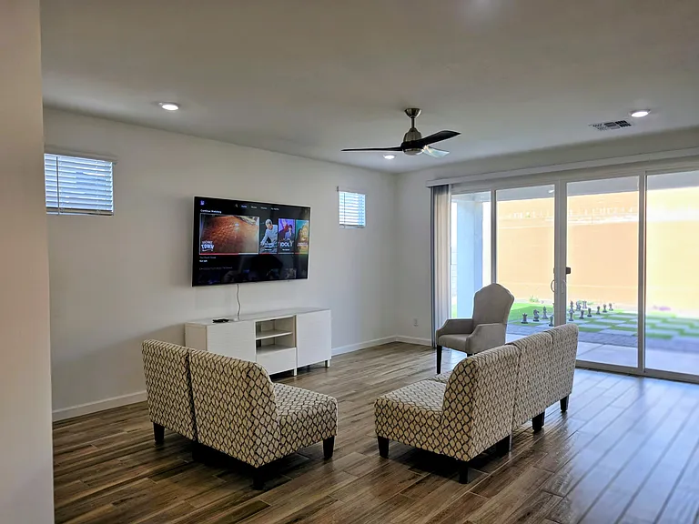 Flexible sitting arrangement with 75" TV