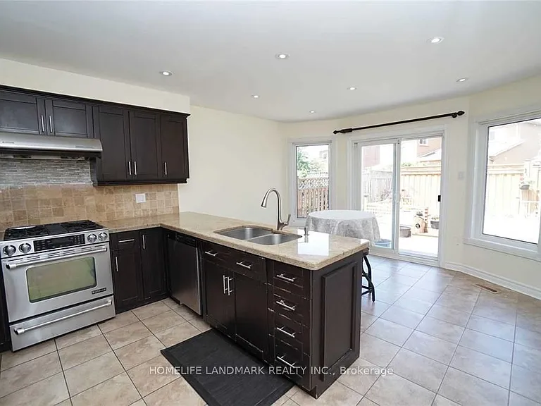 4887 Natkarni Cres — Photo 10