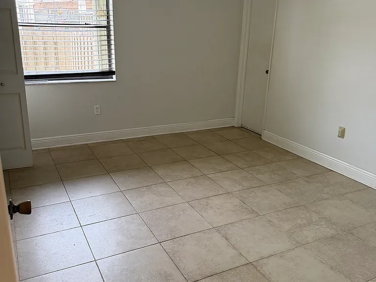Primary bedroom with walk-in closet.