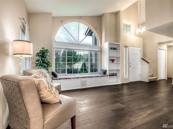 Vaulted ceilings and a window seat with built-ins. 