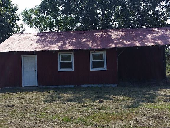 work shop w/ lg pecan tree