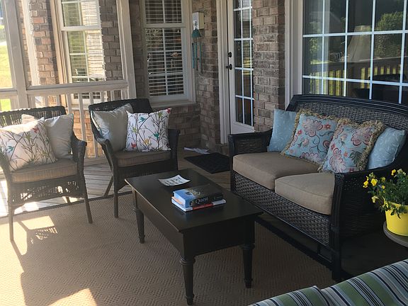 large cozy screened porch