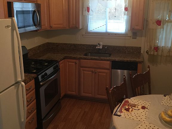 updated kitchen with granite and eat in space