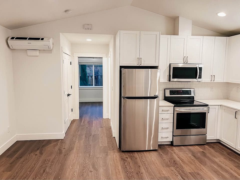 Warm, open living space with modern finishes and flexible layout for relaxing or entertaining.