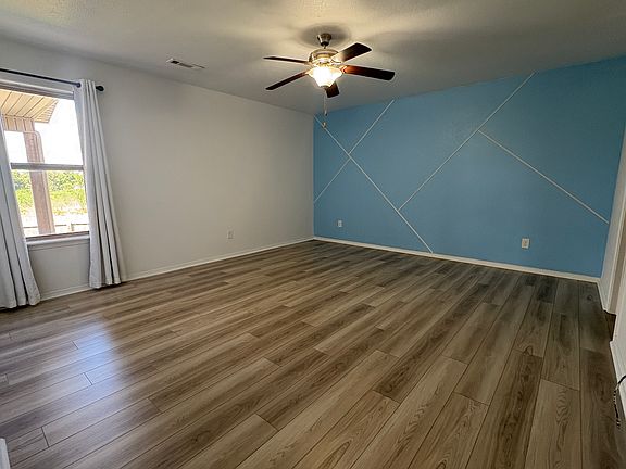 Master bedroom with LVP flooring