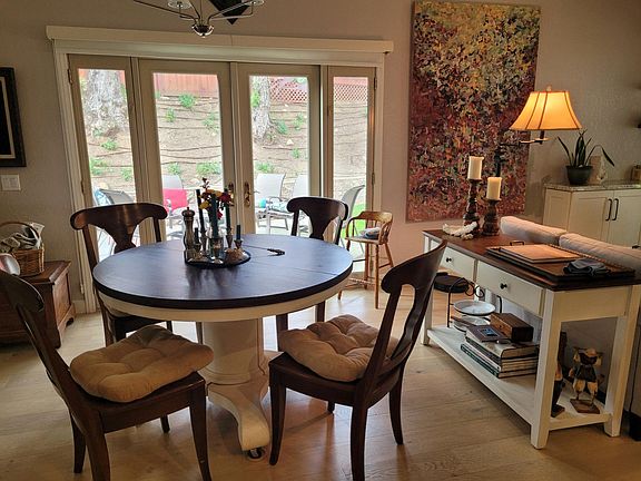 Dining area, French doors looking out on firepit