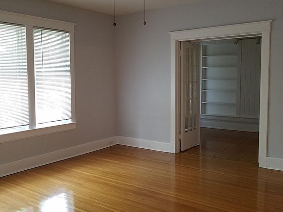 Entry door to study and windows overlooking front yard