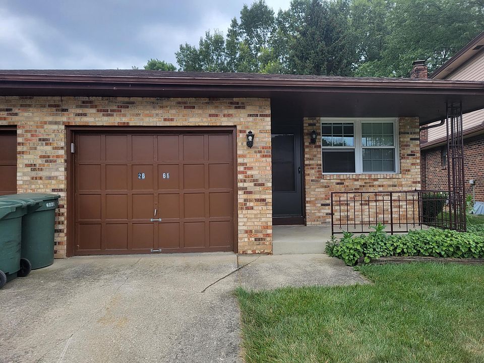 Front Entrance with Driveway and Garage