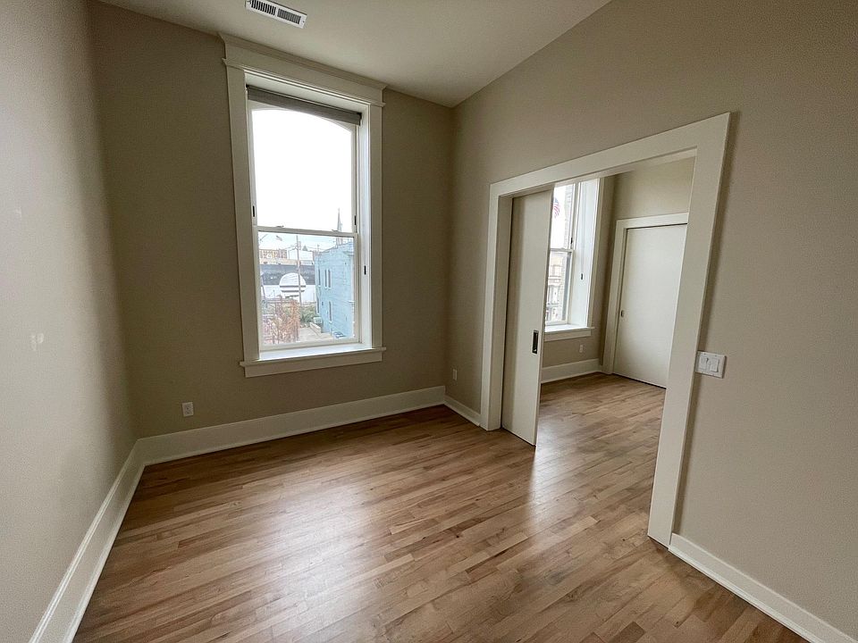 North-facing bedroom separated from office space by sliding doors.
