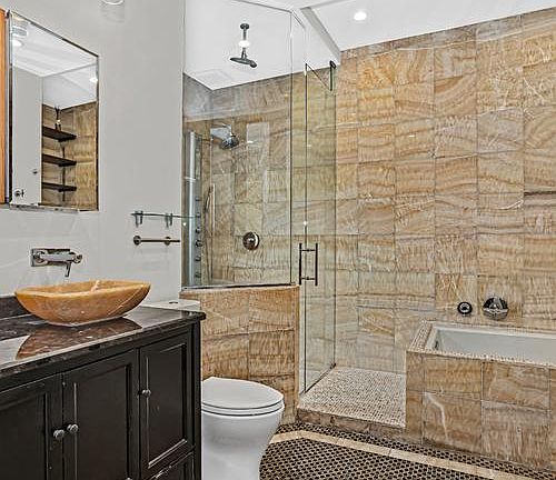 Separate shower and tub and double vanity
