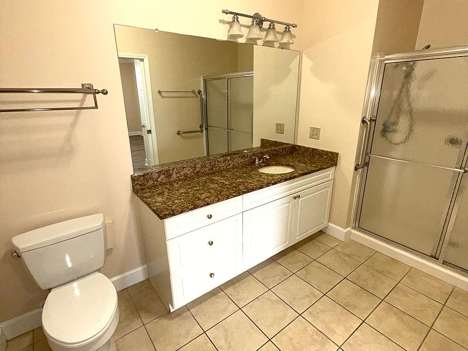 large vanity with granite counter top