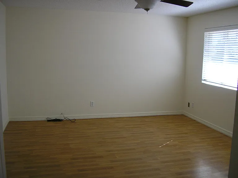 Large double sized Master Bedroom. Room for office/tv area. Ceiling fan, full darkening shades.