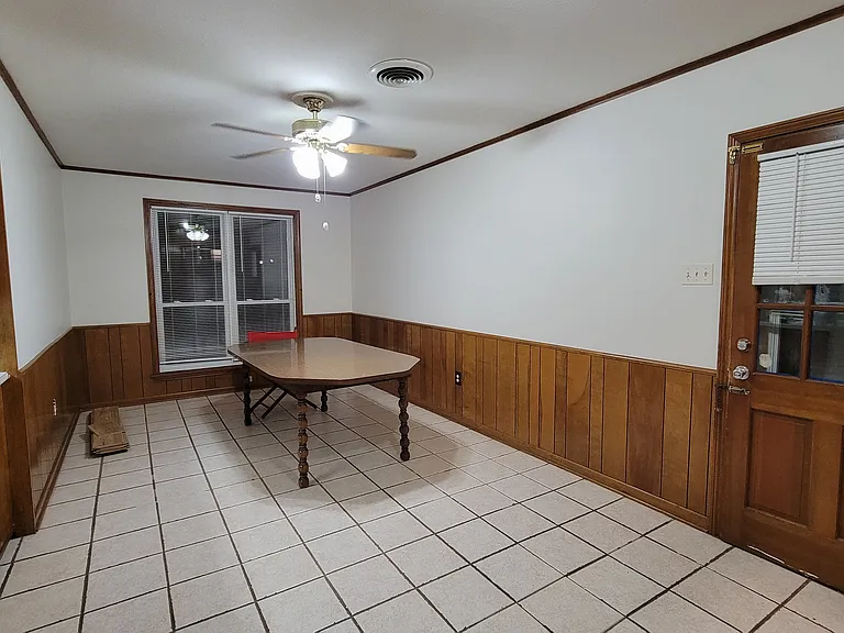 Freshly painted dining room. The table can remain if you chose.