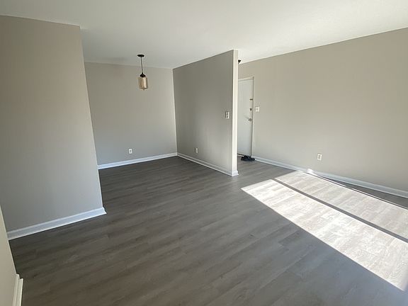 Open concept living and dining room with lots of light!