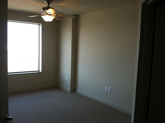 Bedroom + View West on the Riverfront