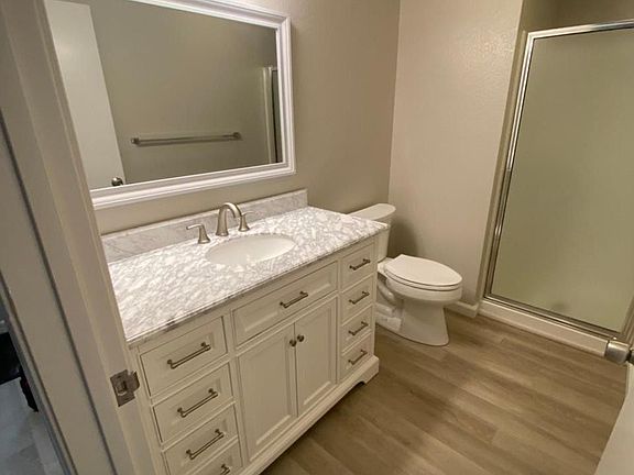 Downstairs bathroom with shower.