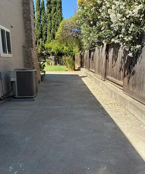 Side yard from gates to backyard