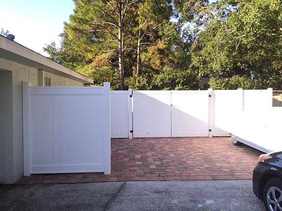 Extra parking/vinyl fence