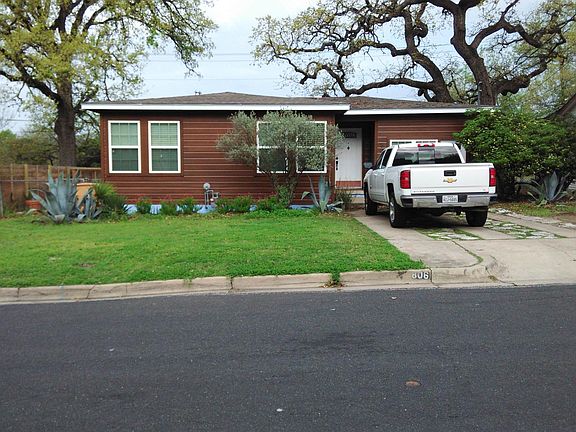 Off street parking on driveway. Stained real wood siding. Double pane windows. Spanish Oak Tree.