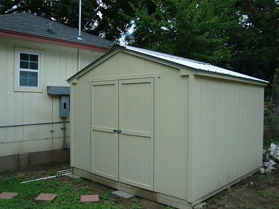 Includes approximately 6'x8' storage shed.