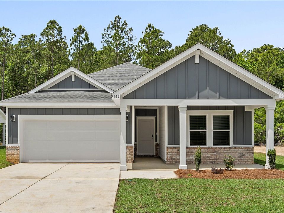 Front exterior of the Chandler floorplan F Elevation .