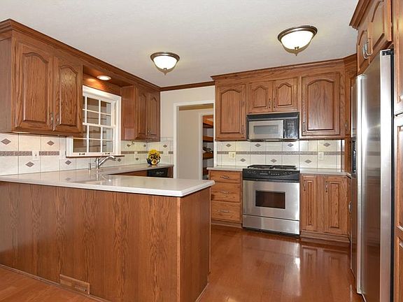 Kitchen with new refrigerator and dishwasher