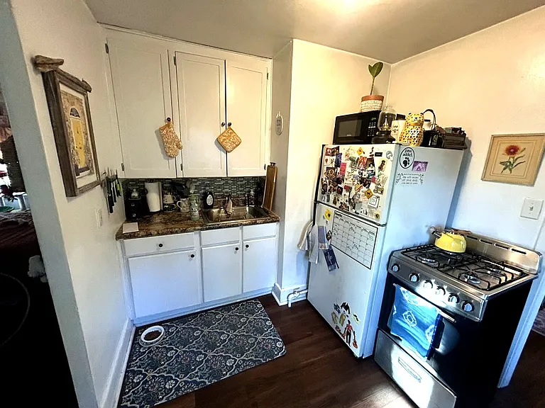Functional kitchen with cabinet storage and gas range