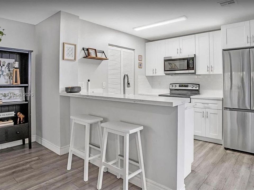 1st image of 8033 NW 71st Ct #Townhouse