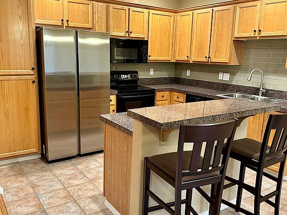 Kitchen with new refrigerator