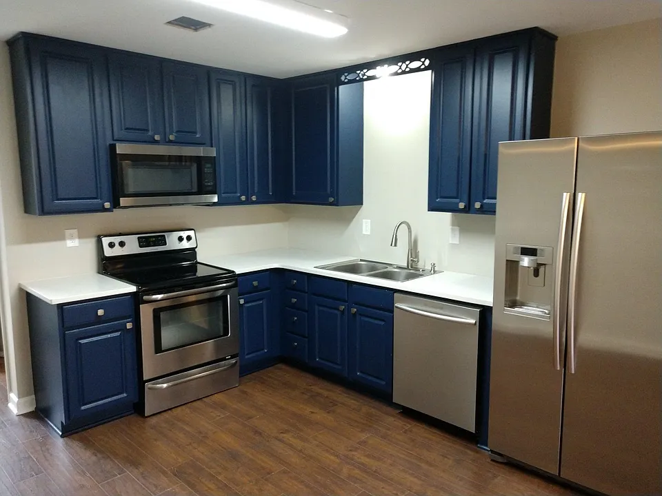 Great kitchen featuring stainless steel appliances, quartz countertops, and more!