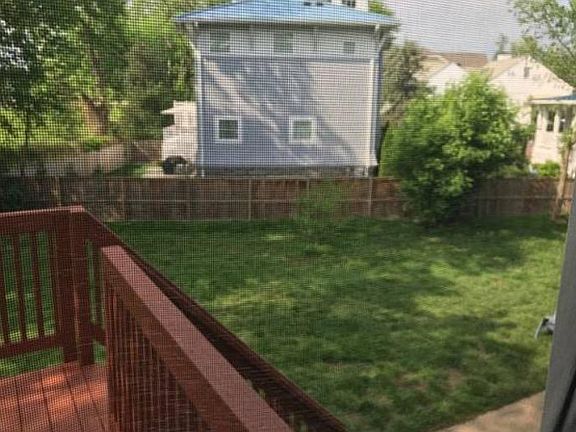 Large fenced-in backyard (shared with neighbors)