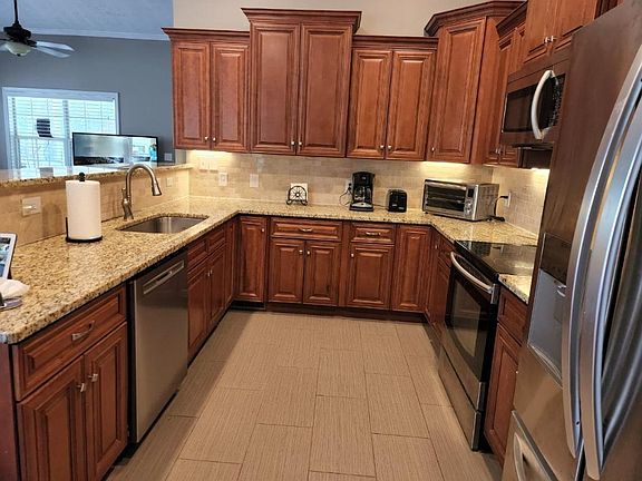 spacious kitchen with stainless steel appliances
