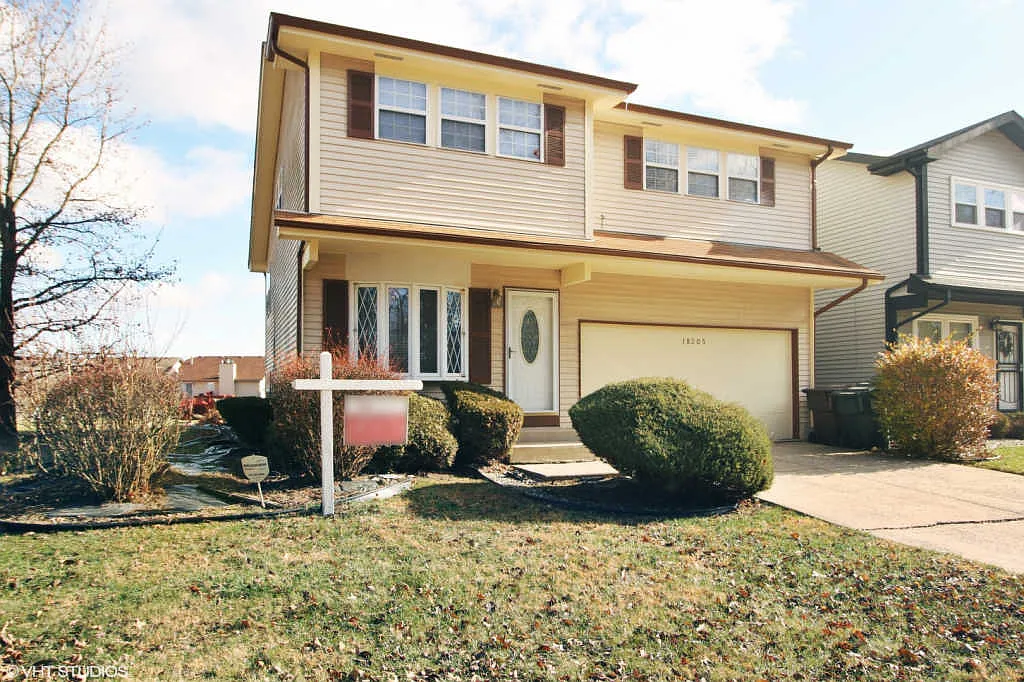 18205 Kostner Ave photo 1