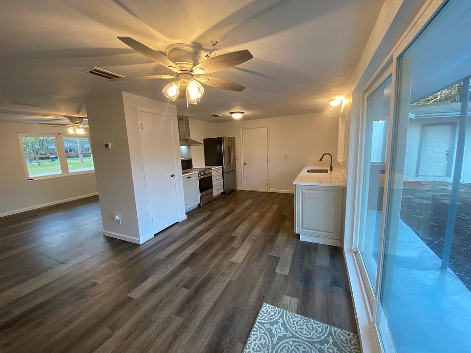 Dining area looking out to kitchen and living room