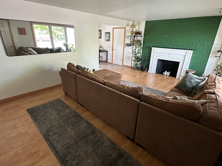 75" Flatscreen TV is currently installed above the fireplace but not pictured.